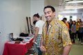 Luther trying one of the items from the Silent Auction. :: &copy; Javier Domínguez